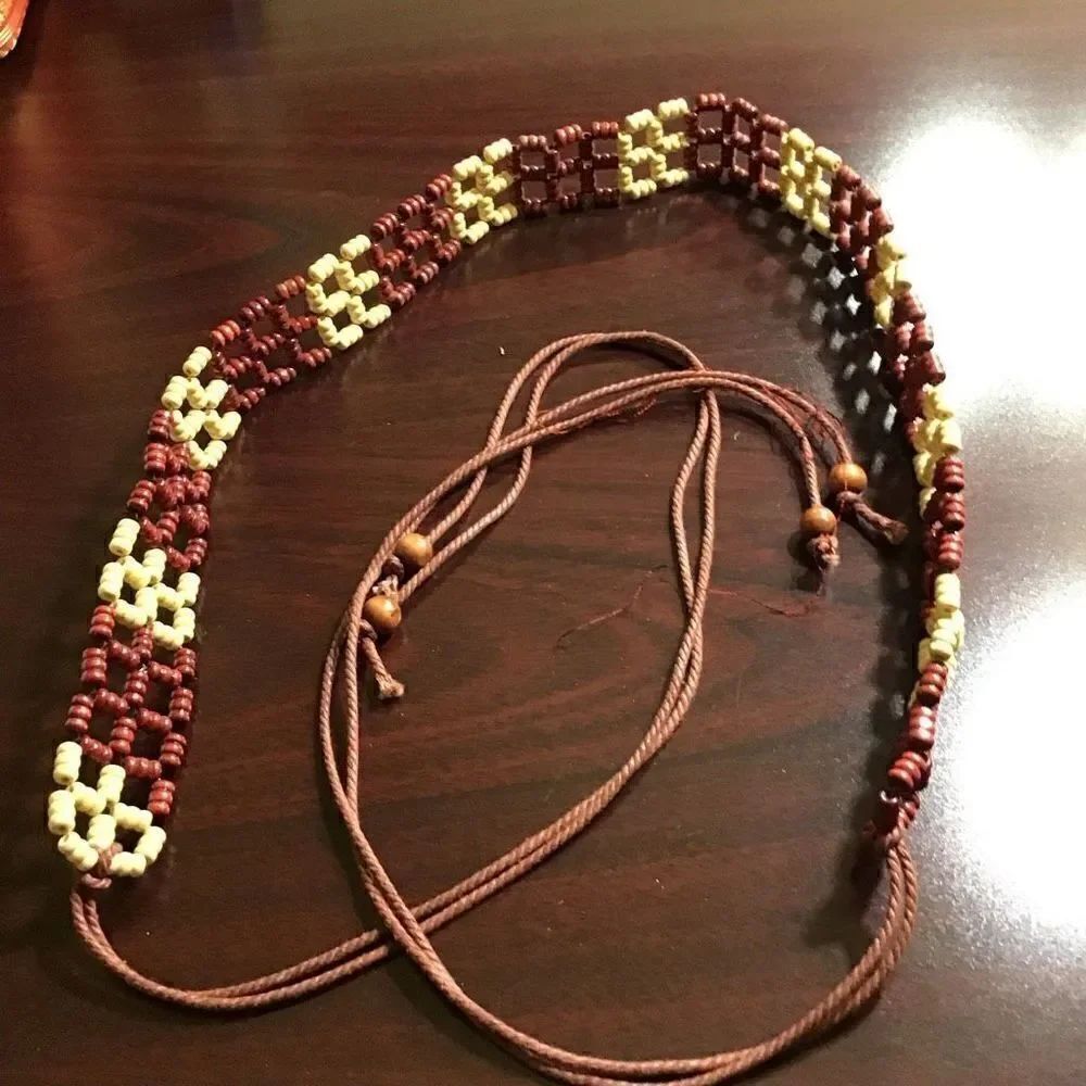 Belt, vintage bead, and tassel from estate sale in Georgia